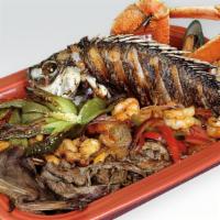 Super Parillada · 5 people. Super family-size platter combination of grilled meats, sautéed mix seafood, shrim...