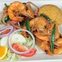 Camarones Bravos · Jumbo head-on shrimps deep-fried with onions and jalapeño slices and seasoned with lime juic...