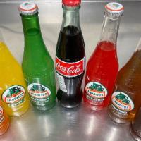 Mexican Sodas And Mexican Jarritos · Mex Coca Cola and Mex Jarritos (made with sugar cane)