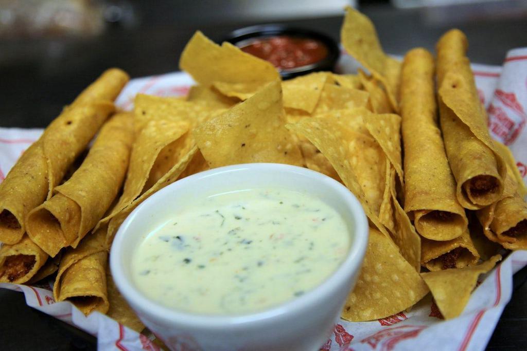 Baja Dippers · baja bites [chicken + cheese hand rolled in-house in a crispy corn tortilla], gringo dip, salsa, tortilla chips