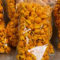 Real Cheddar Cheese Popcorn · A creamy gourmet cheddar cheese coated popcorn some of the best cheese popcorn you’ll ever t...