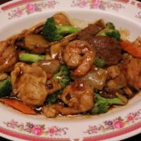 Triple Delight · Chicken, beef, and shrimp with mixed vegetables.
