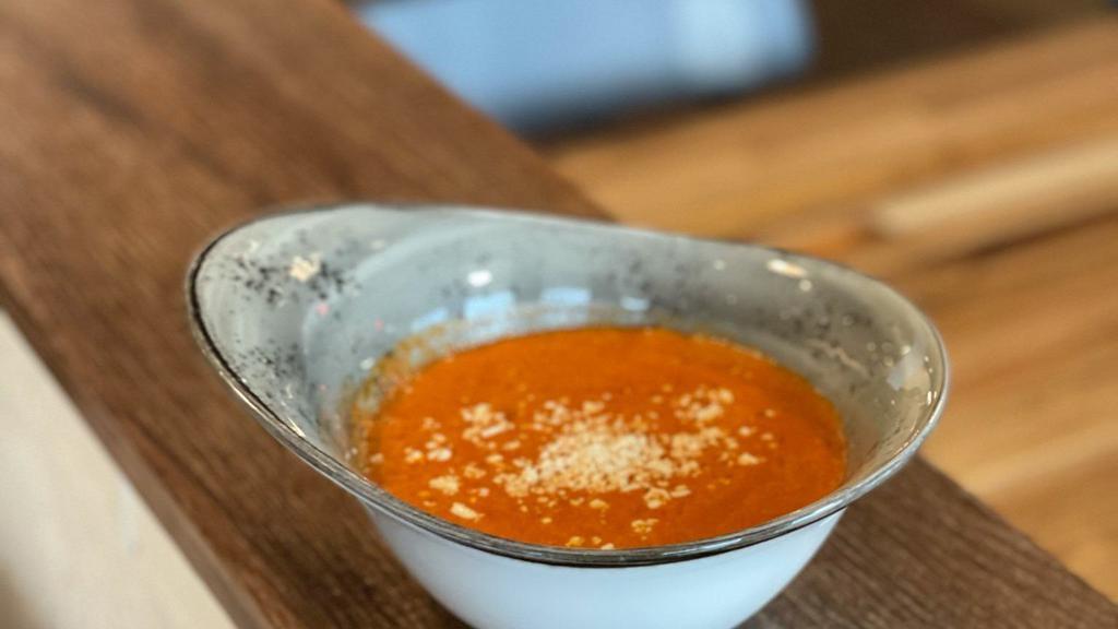 Chile Con Queso · Creamy chile guajillo, queso fresco. Add chorizo for an additional charge.