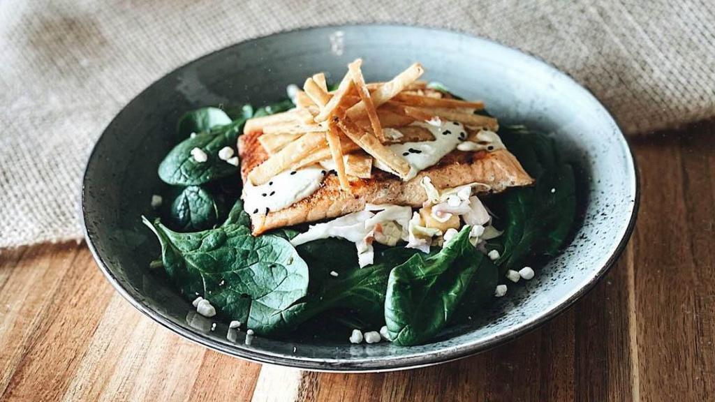 Ensalada Con Salmon · Spinach and mixed greens in tropical vinaigrette, grilled salmon, goat cheese, sesame seeds, toasted almonds, crisp flour strips, hint of jalapeno cream.