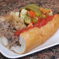 Italian Beef · Fresh Italian Beef Comes with Grilled Onions, Red Sauce, Hot peppers, and Sweet peppers
