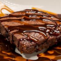 Ghirardelli Triple Chocolate Brownie · Topped with a chocolate and caramel drizzle