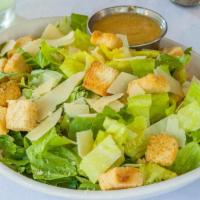 Caesar Salad · Fresh-cut romaine, shaved parmesan, croutons and caesar dressing. Add chicken for an additio...