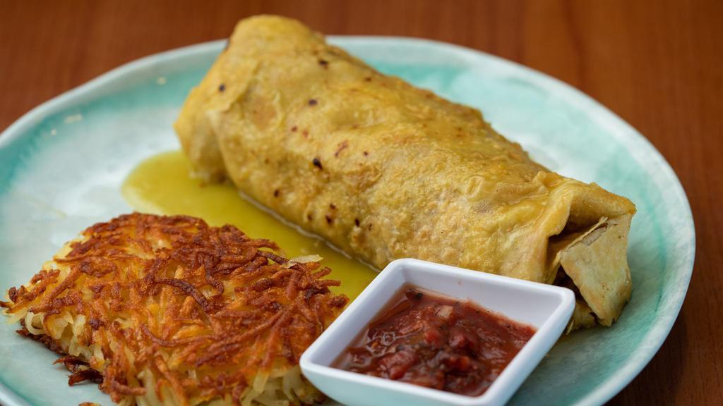 Delano Green Chilli Breakfast Burrito · Eggs, pico, cheese, and your choice of sausage or bacon smothered in a green chili sauce and served with hashbrowns and a side of salsa.
