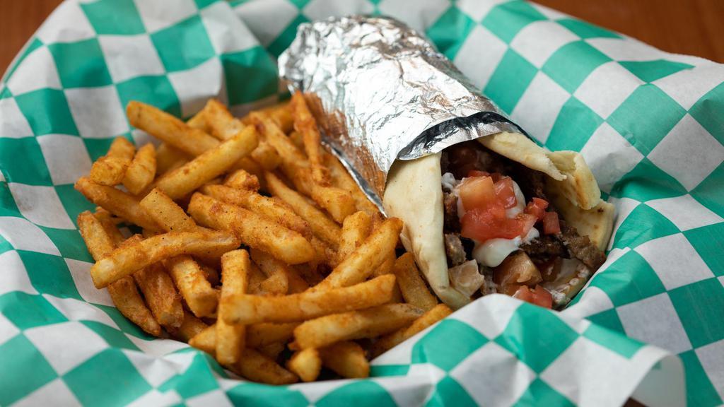 Gyro · Marinated hand cut gyro meat. Wrapped in pita bread with tomatoes, onions, and gyro dressing. Served with seasoned fries.