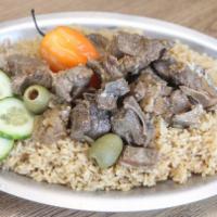 Thiebouyapp · Senegalese style fried rice served with roasted lamb.