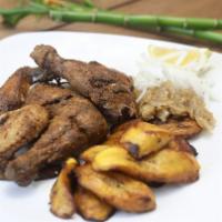 Chicken Dibi · African style grill chicken season with our signature rub. Served with onion sauce and side ...