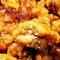 Sesame Chicken · Crispy chicken pieces tossed in a sweet savory honey sesame sauce