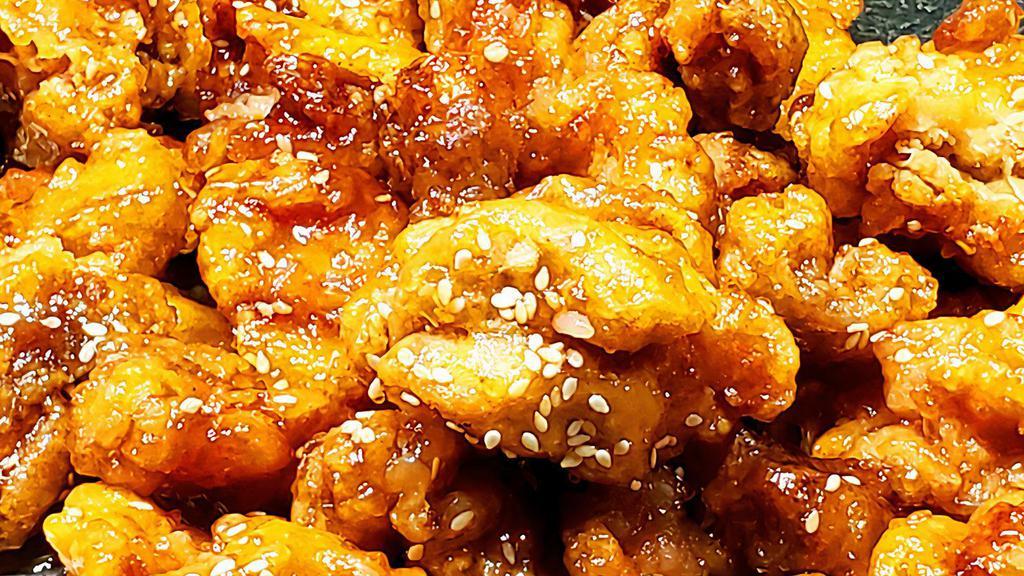 Sesame Chicken · Crispy chicken pieces tossed in a sweet savory honey sesame sauce