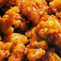 General Tao'S Chicken · House-made sweet and sour Tao's sauce, Szechuan chili oil, Hunan chili