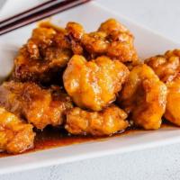 Orange Chicken By Chi Tung · By Chi Tung. Hot. Lightly battered, sliced chicken marinated with orange peel sauteed in bro...