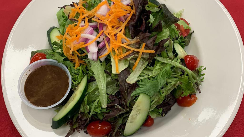 Mixed Greens Salad · Gluten-free. Vegetarian. Mixed greens, cherry tomatoes, cucumber, shredded carrot, red onion choice of balsamic vinaigrette, ranch, blue cheese, French or Italian