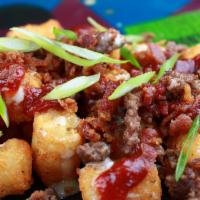 Bbq Cheeseburger Tots · Crispy tots smothered with Queso and S&B's BBQ sauce. Topped with beef, bacon, and green oni...