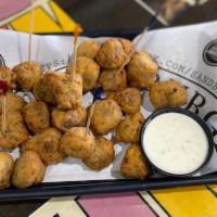 Almost Famous Fried Mushrooms · Hand-battered, marinated mushrooms fried crispy and served with ranch.