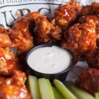 Boneless Wings · Breaded and fried to order. Tossed in your choice of sauce. Served with fresh celery and ran...