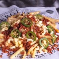 Chili Mac & Cheese Fry · Crispy fries loaded with chili, mac & cheese, cheddar, and jalapenos.