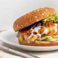 Chicken Bacon Club · Grilled chicken breast topped with bacon, cheddar, lettuce, tomato, avocado and ranch dressi...