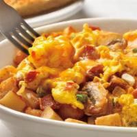 Bakers Scrambler* · Scrambled eggs, cream cheese, ham, mushrooms, green peppers, tomatoes, onions and melted che...