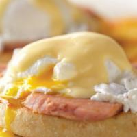 Eggs Benedict* · Smoked ham and two poached eggs over English muffin halves with hollandaise sauce.