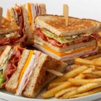 Bakers Club · Slow-roasted, hand-carved turkey, bacon, ham, cheddar cheese, lettuce, tomato and mayonnaise...