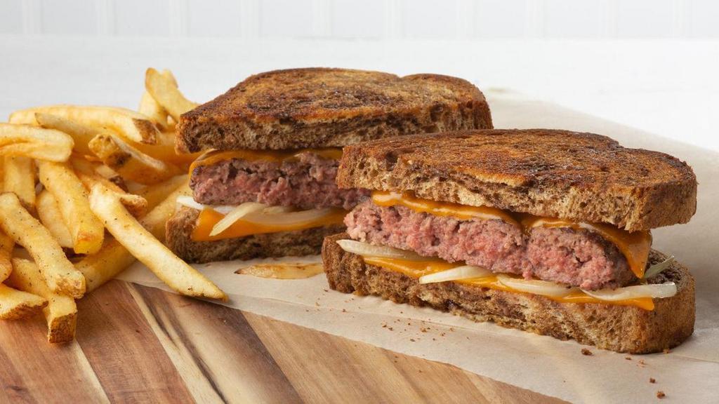 Crush Patty Melt* · Our fresh, never frozen, ground beef burger patty with American cheese and sautéed onions on grilled marble rye bread.