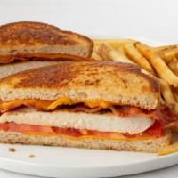 Chicken Cheddar Bacon Melt · Grilled chicken breast, melted cheddar cheese, cherrywood-smoked bacon and tomato.