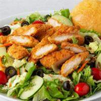 Honey Mustard Chicken Salad · Crispy chicken tenderloins, cucumbers, black olives, tomatoes and candied pecans on mixed gr...