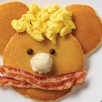 Funny Face* · Three buttermilk pancakes, one egg and choice of two strips of bacon, two sausage links or o...