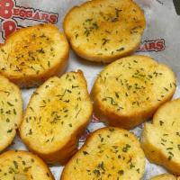 Garlic Bread · BP Garlic Bread is French bread cut in to 9 circles dipped in buttered sprinkled with garlic...