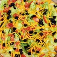 Taco Pizza · BP Taco Pizza is our original style crust generously sauced with our salsa, your choice of g...