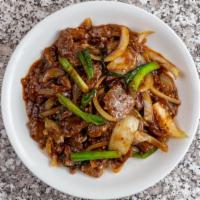 Mongolian Beef · Hot & Spicy. Sliced beef sautéed with green onions and white onions in a delicate sauce.