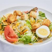 Side Salad · Mixed greens, tomato, egg, roasted corn, cucumber, cheddar cheese and croutons