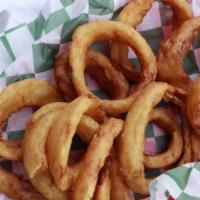 Whiskey Battered Onion Rings · Sweet yellow onions tossed in light beer and whiskey batter, server pipin' hot!