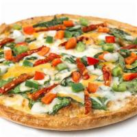Pesto Veggie · Sarpino's traditional pan pizza baked to perfection, topped with a layer of home-made garlic...
