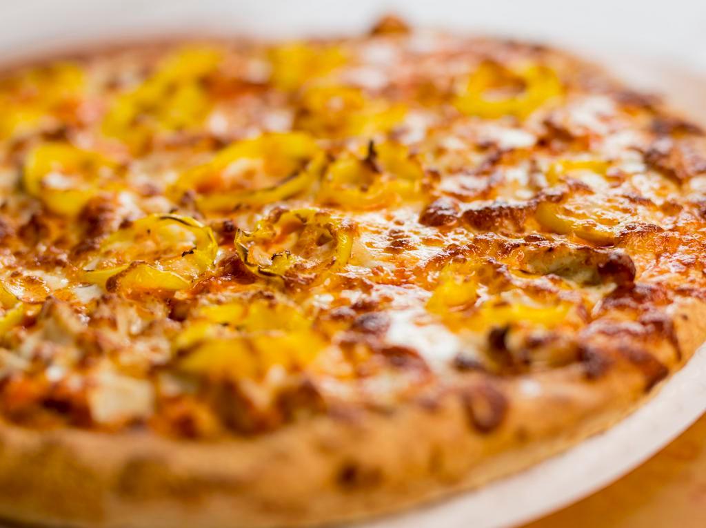 Buffalo Ranch Chicken · Ranch and buffalo-style hot sauce base, grilled chicken strips, parmesan cheese, banana peppers, and our signature gourmet cheese blend.