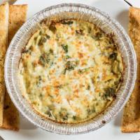 Spinach Artichoke Dip · Made daily with fresh spinach, artichoke hearts, a variety of cheeses with signature blend, ...