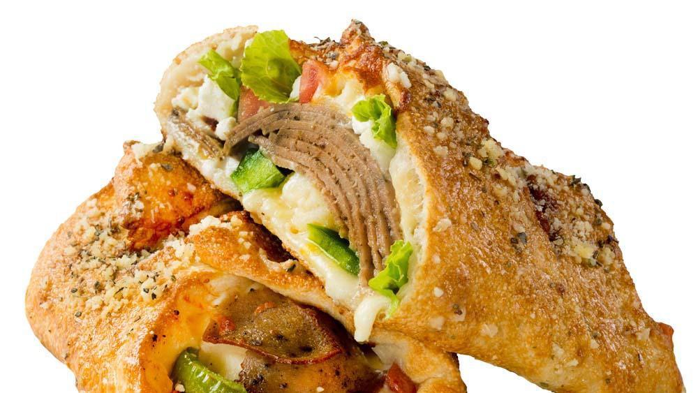 Gyro Calzone (Regular) · Slow-roasted gyro meat, freshly diced tomatoes, tender onions and green peppers, feta cheese and crisp lettuce tossed in our famous tzatziki sauce and wrapped in a golden-brown crust, brushed with rich garlic butter and sprinkled parmesan cheese.