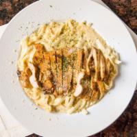 Fettuccine Alfredo · Baked Fettuccine with you choice of homemade meat sauce, Alfredo or marinara sauce serve wit...