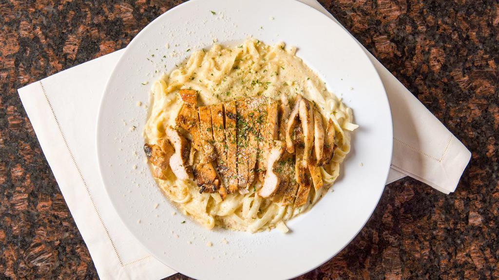 Fettuccine Alfredo · Baked Fettuccine with you choice of homemade meat sauce, Alfredo or marinara sauce serve with chicken breast and bacon topped with gourmet cheese mix.