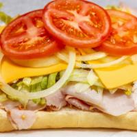 Turkey Sandwich · Sliced turkey, American cheese, lettuce, tomato, onions & mayonnaise.