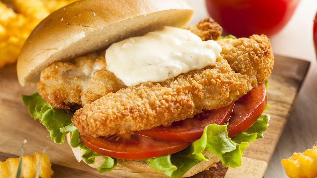 Fish Sandwich · Fresh and tasty fried fish sandwich with cheese, lettuce, and tomato.