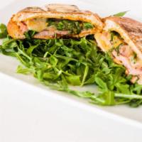 Panini With Turkey And Pesto · Perfect panini loaded with delectable turkey, delicious pesto, creamy cheese, and sprouts.