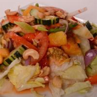 Sweet Chili Salad With Chicken · Bell pepper, cucumber, red onion, pineapple, celery, and tomato in sweet chili dressing on a...