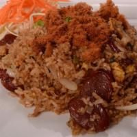 Sweet Sausage Fried Rice · Jasmine rice with Thai pork sausage and onions. Topped with sweet shredded pork.