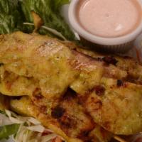 Grilled Chicken Satay (4) · Skewer marinated chicken tenders with peanut sauce.