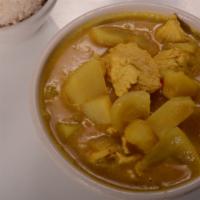 Yellow Curry With Chicken · Yellow turmeric powder, chunk potato, and yellow onion.